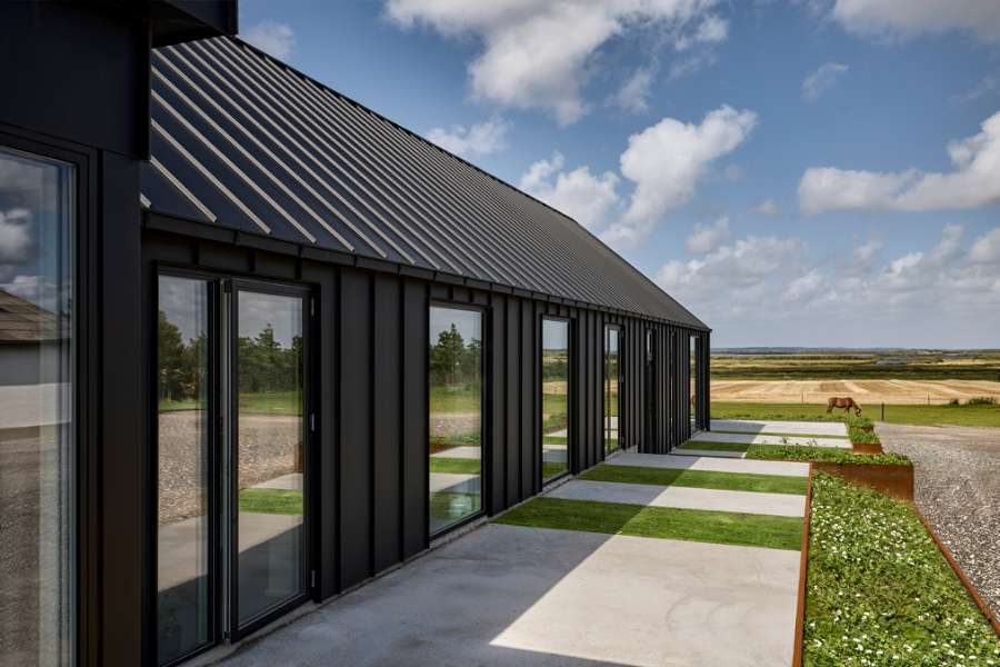 Steel roof and facade set the stage for Danish countryside charm, Bøelvej 13, 6880 Tarm, Denmark